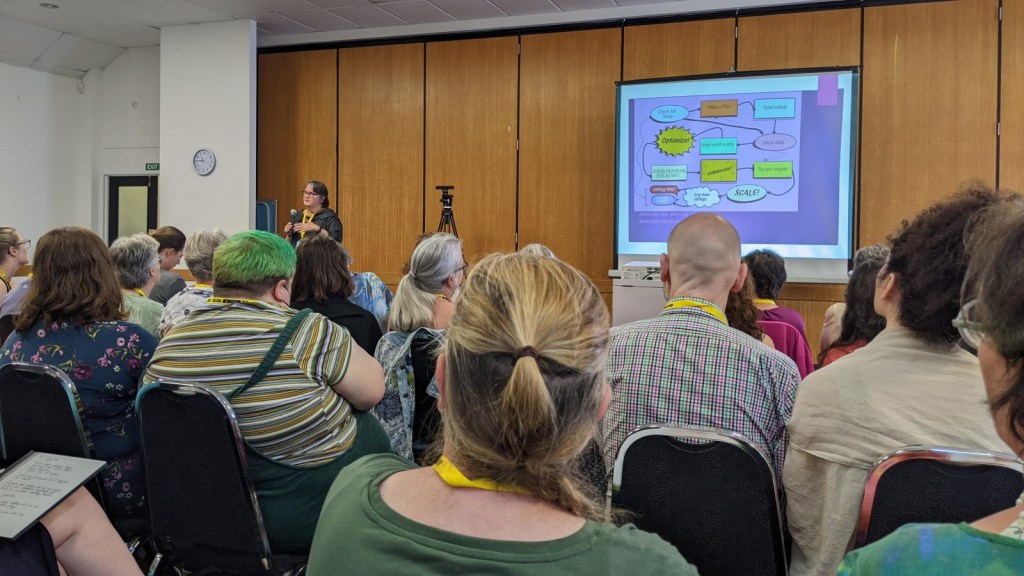 20 Books Auckland. Seated audience listening to a speaker.