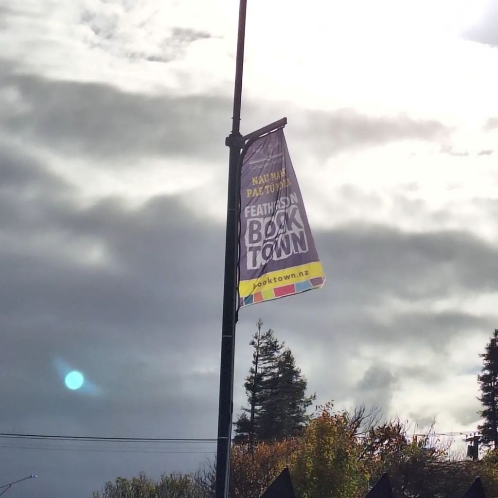 Featherston Booktown Karukatea Festival banner on a streetlamp
