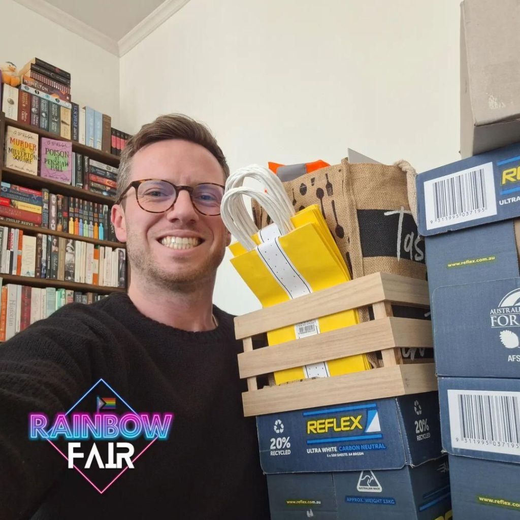 Selfie with author G B Ralph and boxes of books