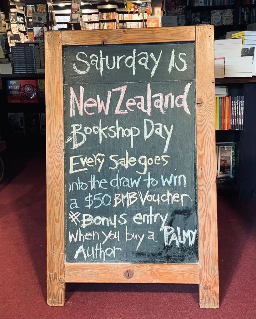 New Zealand bookshop day notice on chalkboard