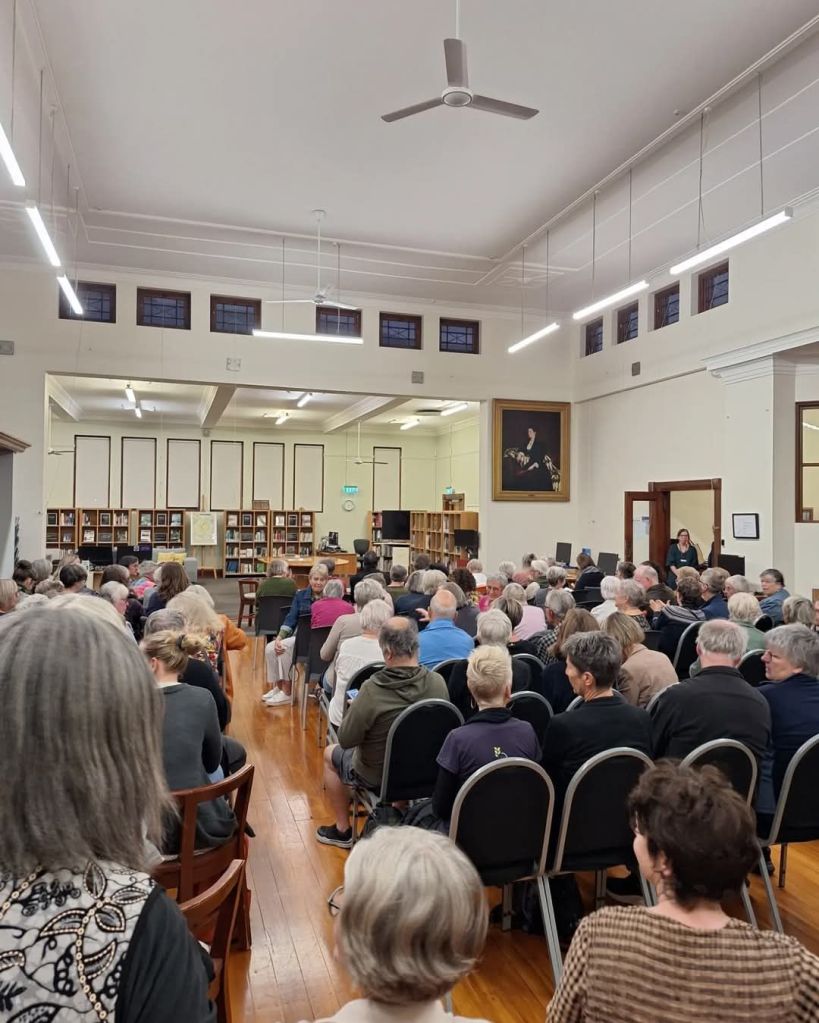 A seated audience at the Whanganui Library.