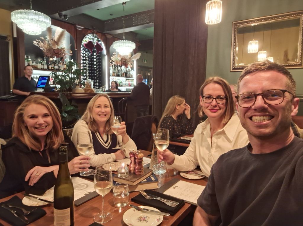 Selfie with four people in a restaurant